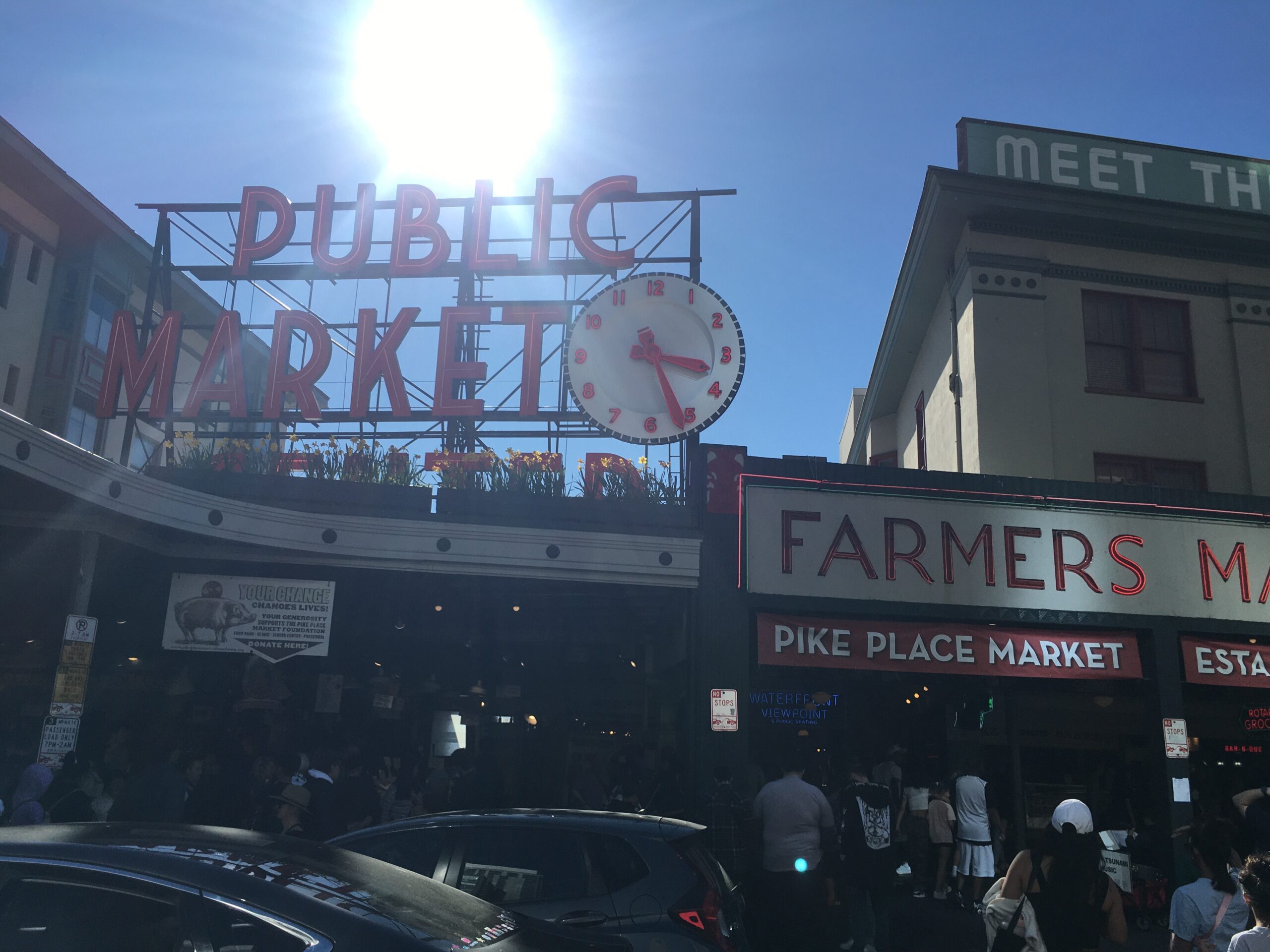 The historic Pike Place Market in Seattle, depicting a storefront sign that shows "Public Market"