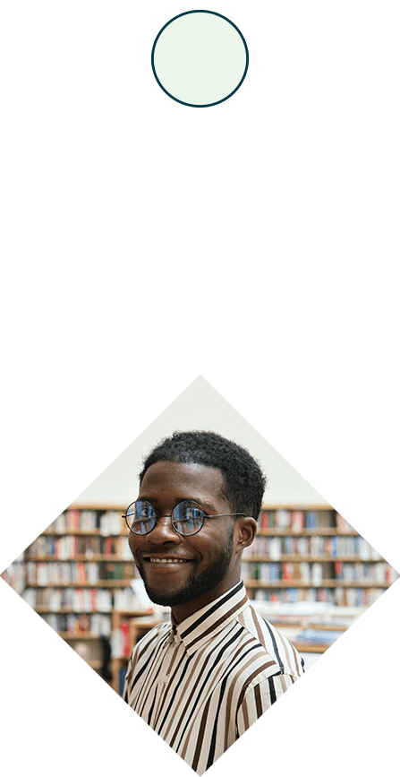 Smiling Black man in a library